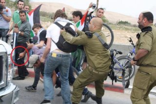 Were the Activists Really Unarmed?